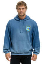 Load image into Gallery viewer, AVIATOR NATION SURFER WAVE PATCH PULLOVER RELAXED HOODIE - FADED WATER
