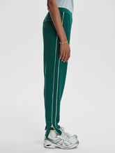 Load image into Gallery viewer, VARLEY THE SLIM PIPED PANT 27.5&quot; - FOREST
