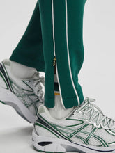 Load image into Gallery viewer, VARLEY THE SLIM PIPED PANT 27.5&quot; - FOREST
