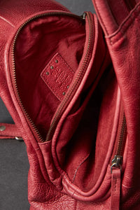 FREE PEOPLE WE THE FREE SOHO CONVERTIBLE SLING - CRIMSON